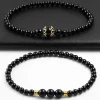 2 armbånd med agatkugler og charms / Dobbelt