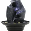 Lille vandspil i Terrazzo look med LED lys